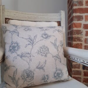 Pastel blue floral print cushion